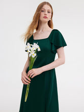 The green dress is made of viscose fabric.